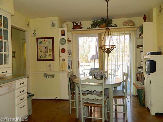 327 Traceway Road High Point, NC 27265 - Photo 7 of 16 Breakfast. Breakfast nook in kitchen looks out onto back deck and yard
