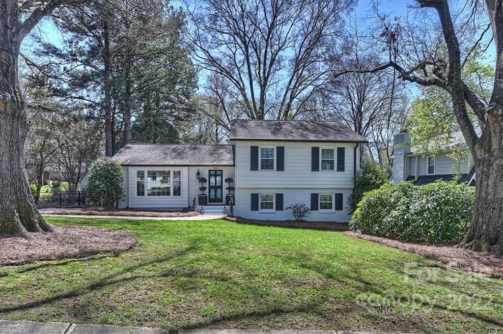 3616 Round Oak Road Charlotte, NC 28210 - Photo 2 of 48 a house that has tree in front of it