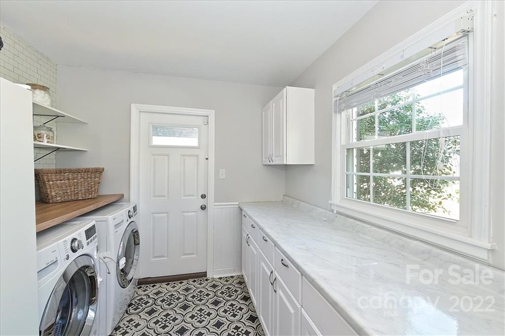 3616 Round Oak Road Charlotte, NC 28210 - Photo 21 of 48 a view of a kitchen with washer and dryer