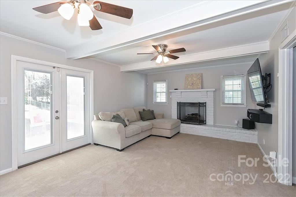 3616 Round Oak Road Charlotte, NC 28210 - Photo 31 of 48 a living room with furniture and a fireplace