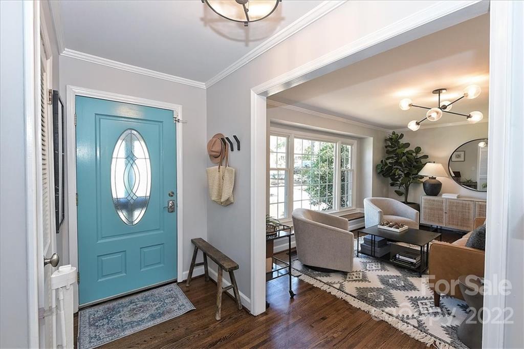 3616 Round Oak Road Charlotte, NC 28210 - Photo 4 of 48 a living room with furniture a window and wooden floor