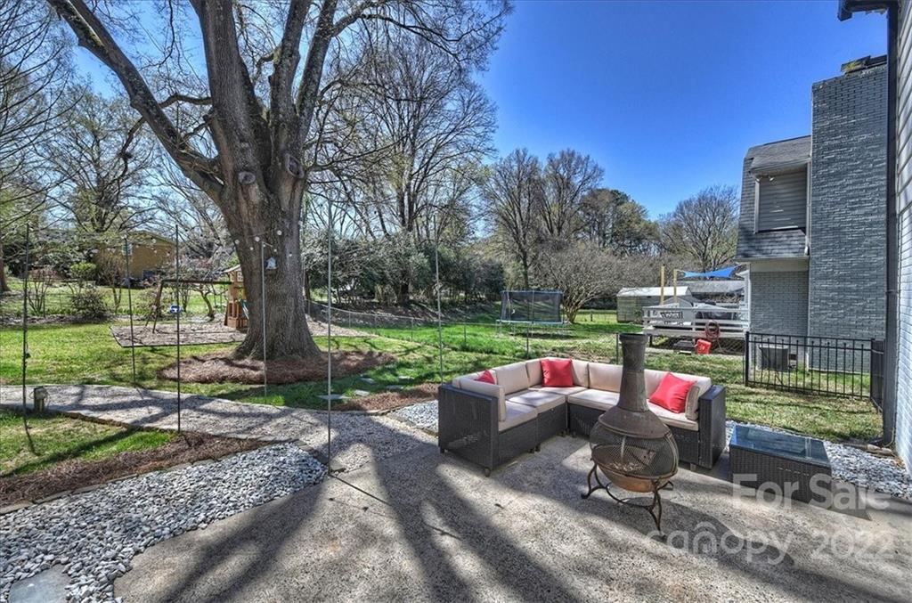 3616 Round Oak Road Charlotte, NC 28210 - Photo 42 of 48 a garden view with a seating space