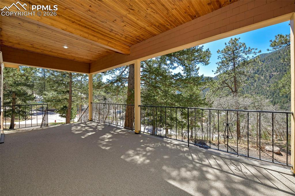4530 Hagerman Road Cascade, CO 80809 - Photo 7 of 47 Covered Deck/Porch With Mountain Views