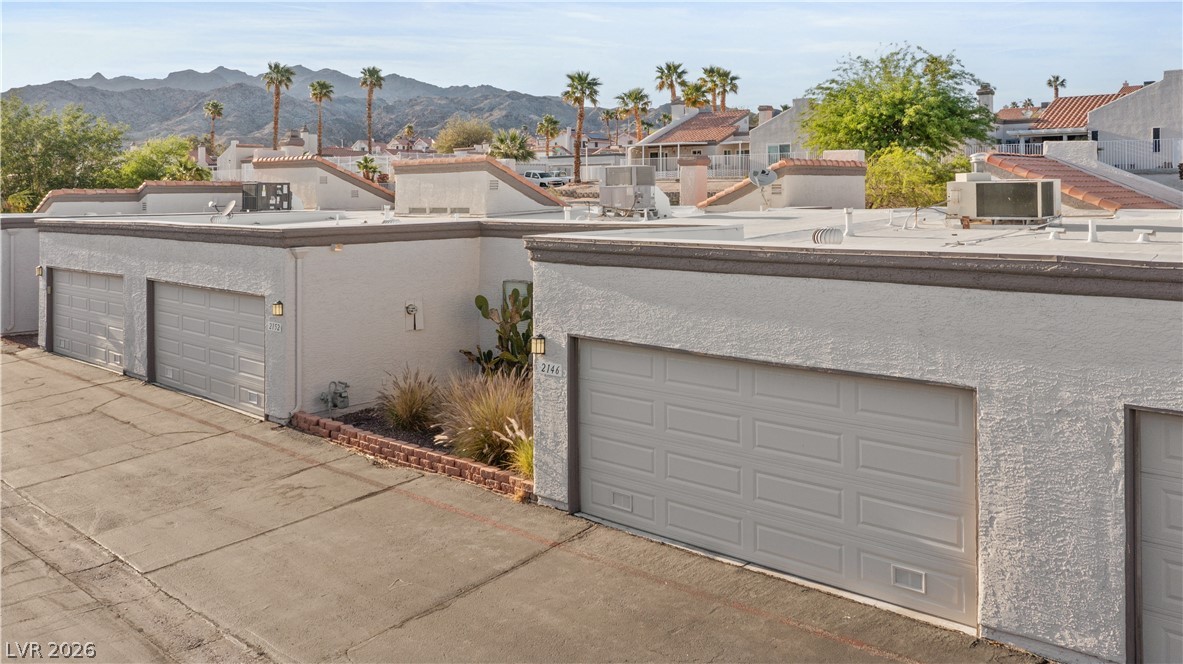 2146 High Dunes Lane Laughlin, NV 89029 - Photo 63 of 64 Garage with a mountain view and a residential view
