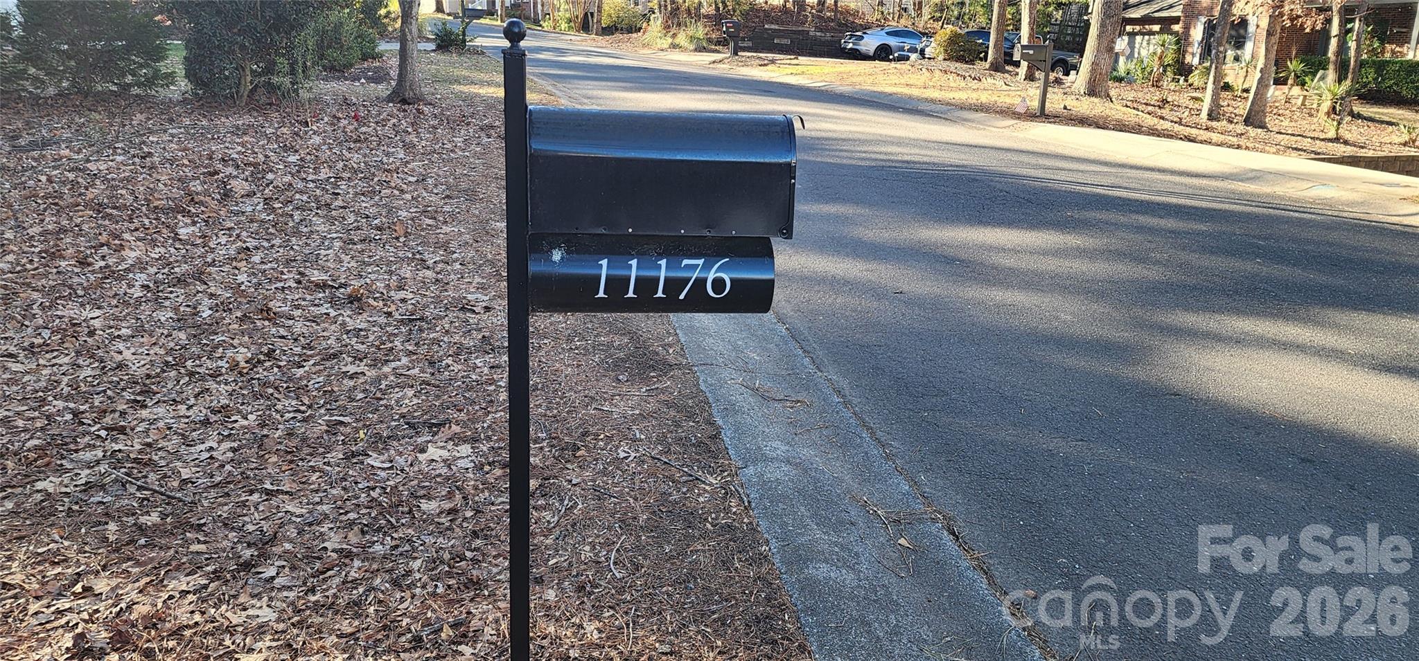 11176 Watertrace Drive Fort Mill, SC 29708 - Photo 30 of 30 a view of a pathway with a bench