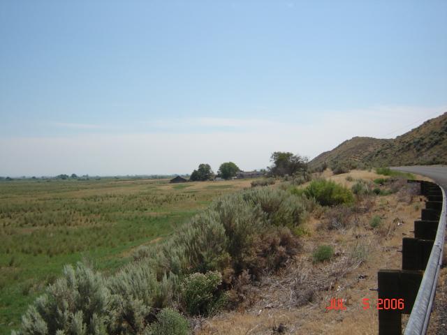7603 Pumphouse Road Toppenish, WA 98948 - Photo 8 of 15 a view of a field with an ocean