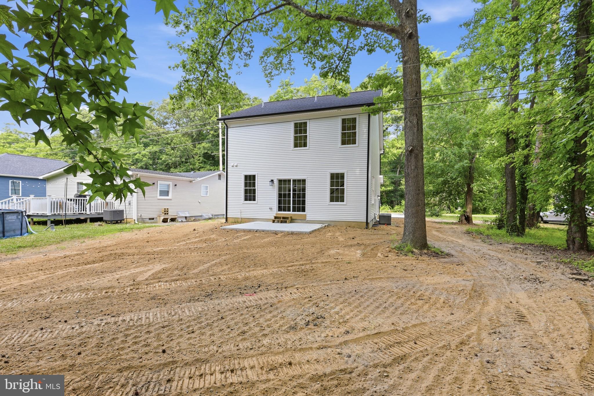 1354 College Road Dover, DE 19904 - Photo 38 of 46 front view of a house with a yard