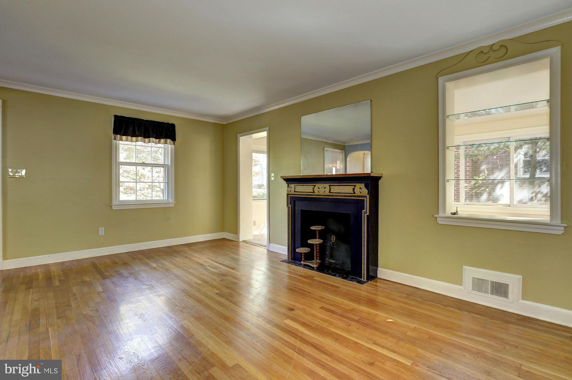 9222 Glenville Road Silver Spring, MD 20901 - Photo 5 of 30 Living Room with Decorative Fireplace