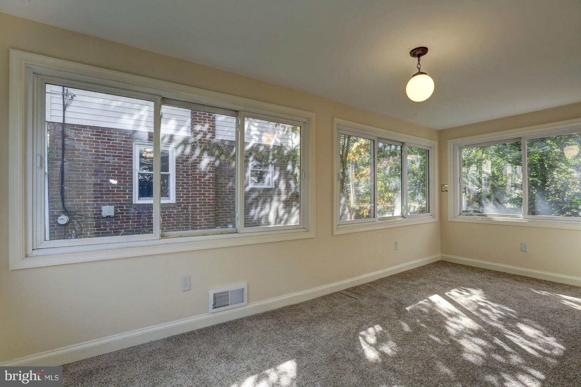 9222 Glenville Road Silver Spring, MD 20901 - Photo 6 of 30 Sun Room