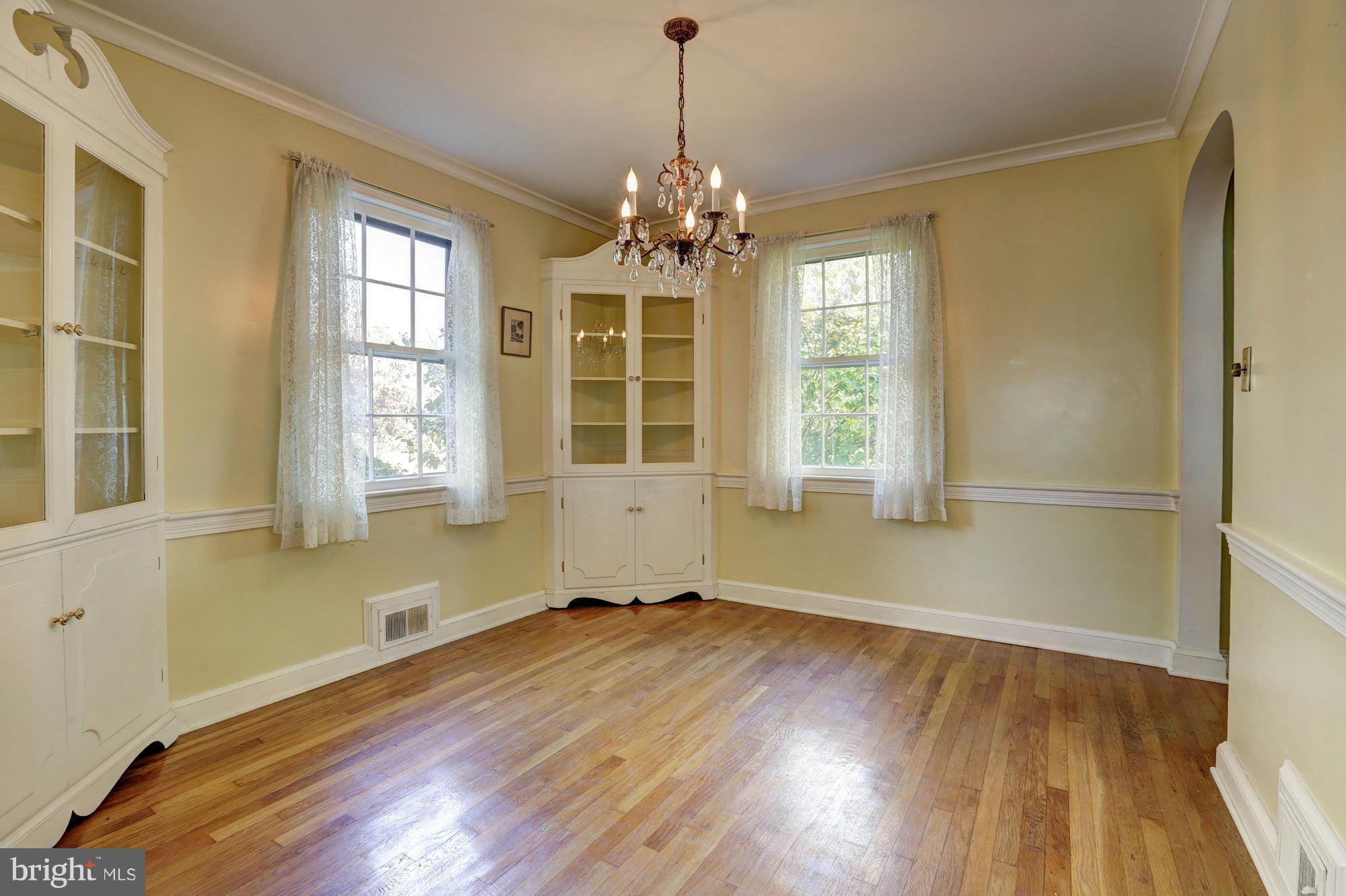 9222 Glenville Road Silver Spring, MD 20901 - Photo 9 of 30 Dining Room, Chair and Crown Molding