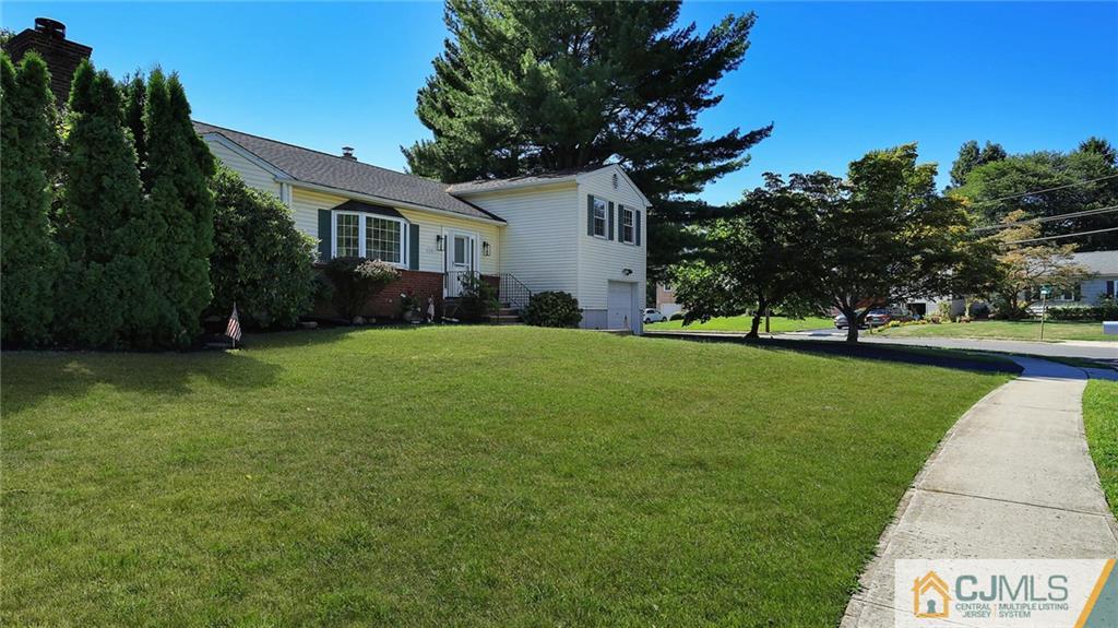 1884 Holly Road North Brunswick, NJ 08902 - Photo 2 of 39 a view of a house with a big yard