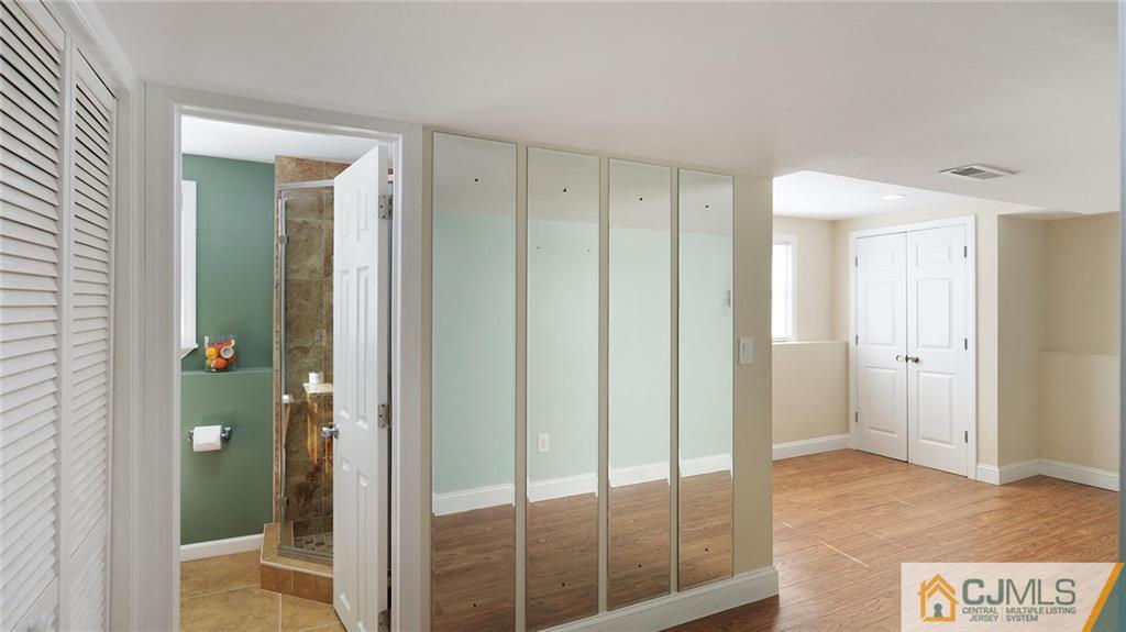 1884 Holly Road North Brunswick, NJ 08902 - Photo 28 of 39 a view of hallway with shower
