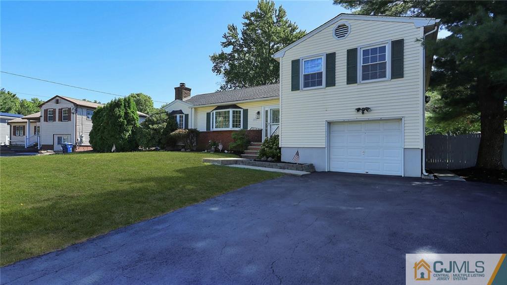 1884 Holly Road North Brunswick, NJ 08902 - Photo 3 of 39 a view of house with a yard