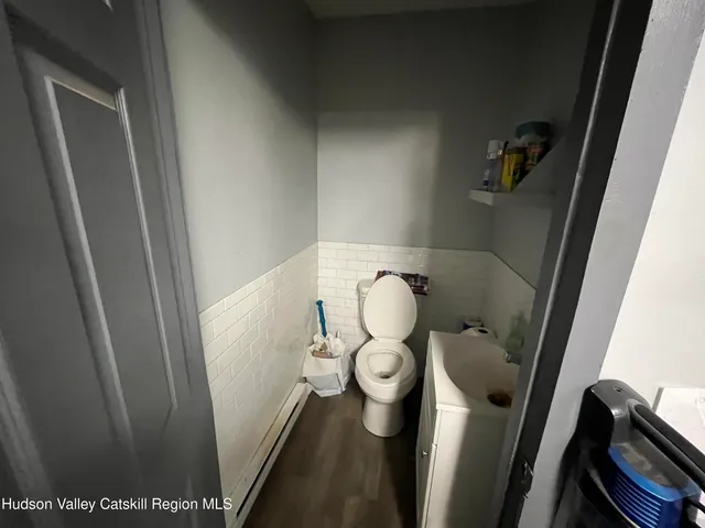a bathroom with a sink and toilet