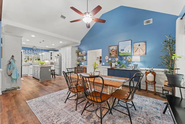 a view of a dining room with furniture
