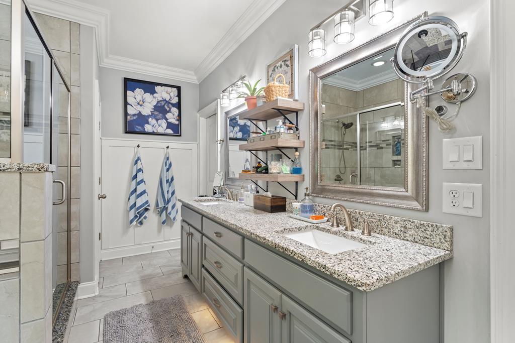 2800 Hopewell Church Road Pine Mountain, GA 31822 - Photo 23 of 38 a bathroom with a granite countertop sink and a mirror