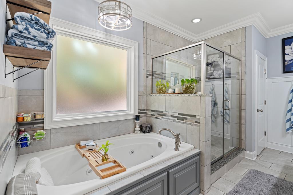 2800 Hopewell Church Road Pine Mountain, GA 31822 - Photo 24 of 38 a bathroom with a tub a sink and a shower