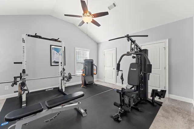 a view of a room with gym equipment