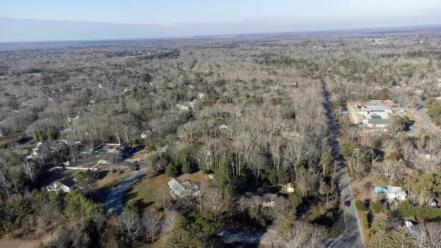an aerial view of a city with lots of residential buildings