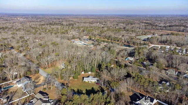 an aerial view of residential building and ocean