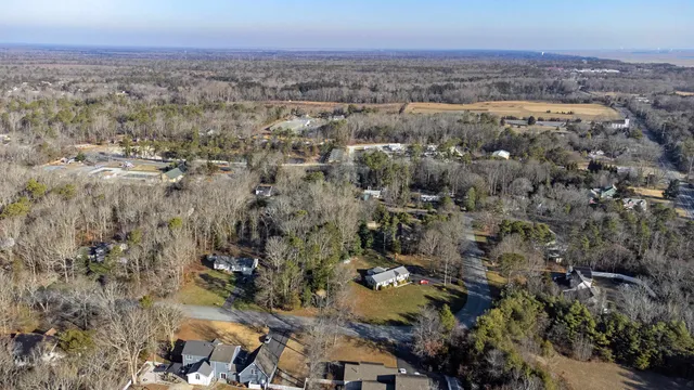 an aerial view of residential house and green space
