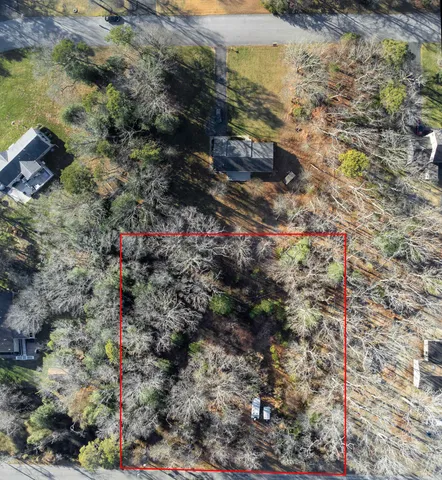 an aerial view of residential house with outdoor space