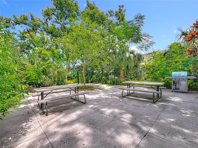 a view of bench in a backyard