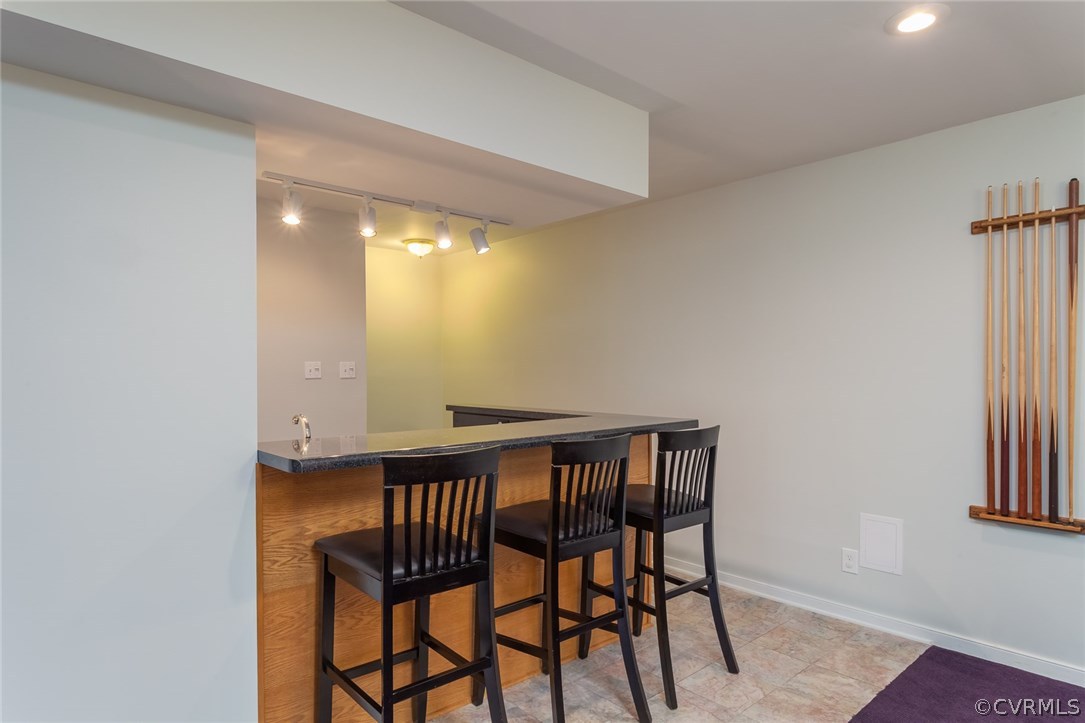 5702 Grove Forest Road Midlothian, VA 23112 - Photo 24 of 30 a view of a dining room with furniture and a window