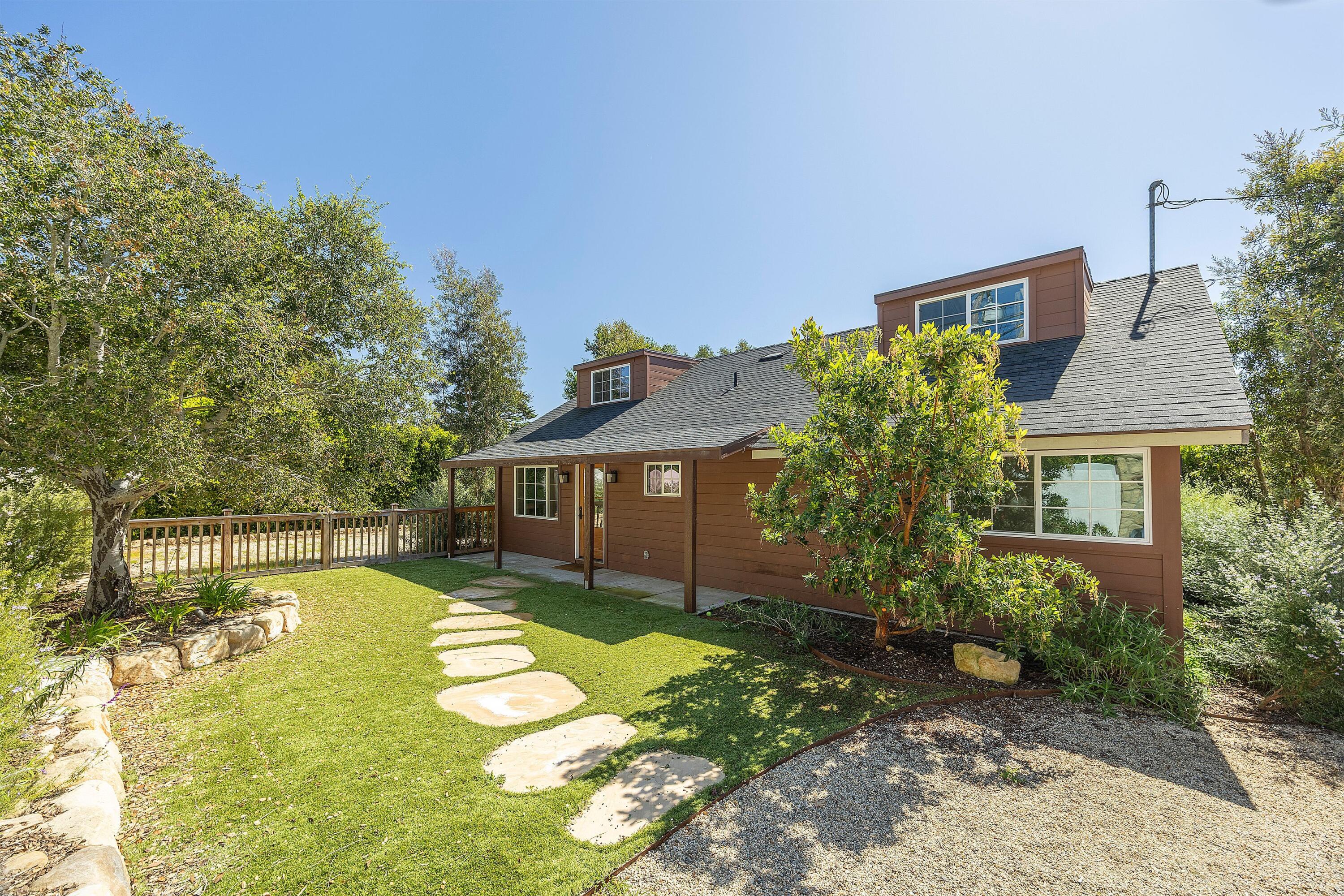 487 Hot Springs Road Santa Barbara, CA 93108 - Photo 20 of 47 front view of a house with a yard