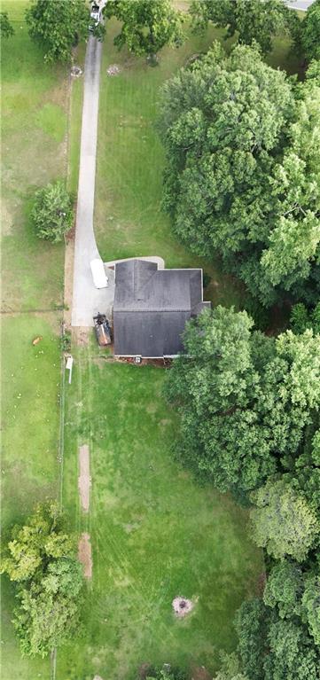 4755 Jersey Walnut Grove Road Covington, GA 30014 - Photo 1 of 1 a aerial view of a house with a yard and lake view