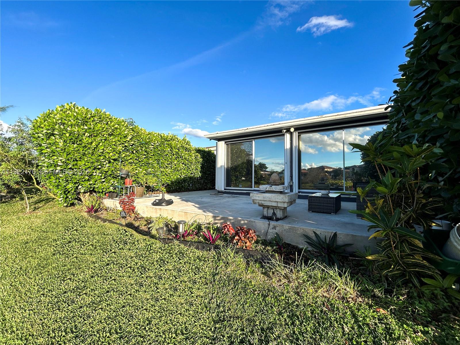 4905 Northwest 49th Road Tamarac, FL 33319 - Photo 21 of 25 a view of yard with green space