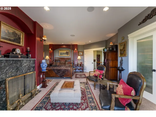a living room with furniture a flat screen tv and outdoor dining table