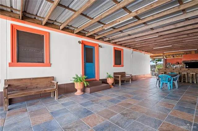 a outdoor space with lots of tables and chairs