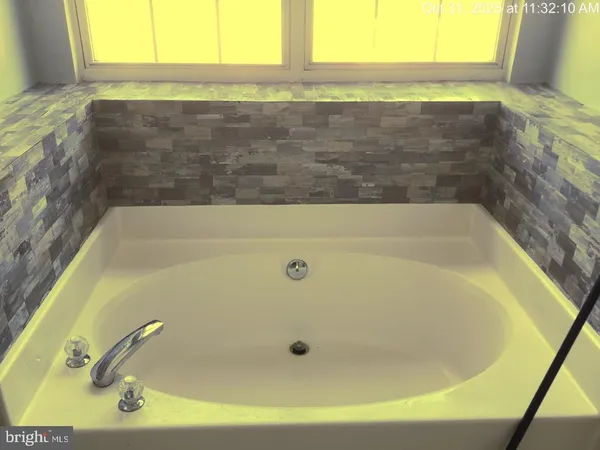 a bathroom with a bathtub