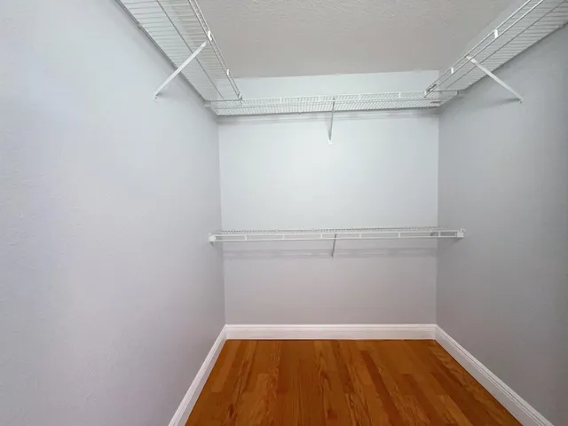 a bathroom with a shower and a sink