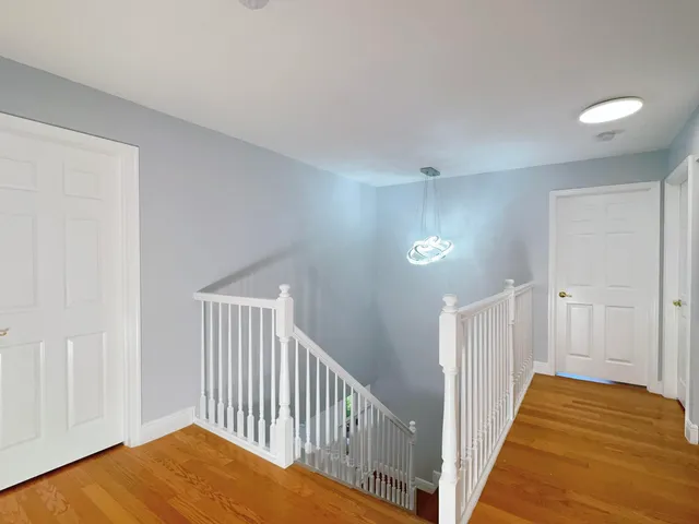 an aerial view of a house with a garden