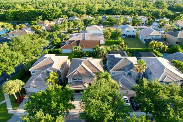 an aerial view of a city with lots of residential buildings