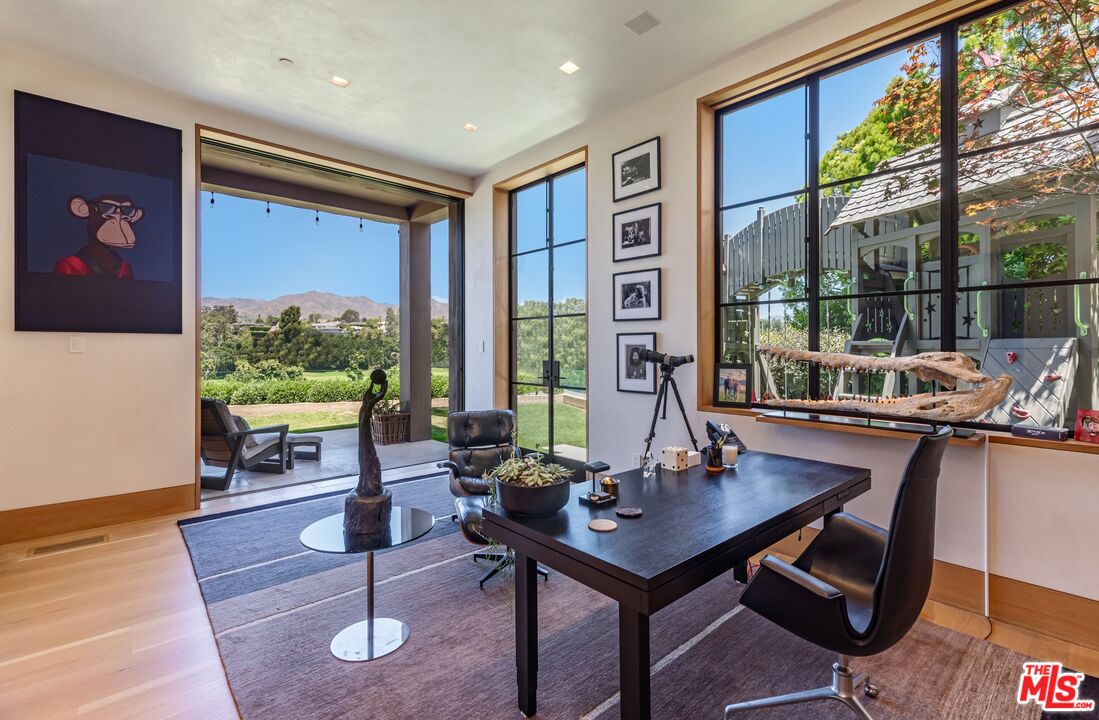859 Woodacres Road Santa Monica, CA 90402 - Photo 35 of 54 a view of a livingroom with furniture and window