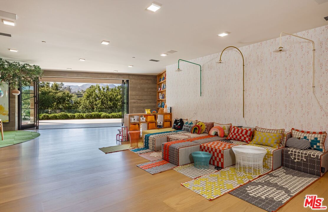 859 Woodacres Road Santa Monica, CA 90402 - Photo 37 of 54 a living room with furniture and a large window