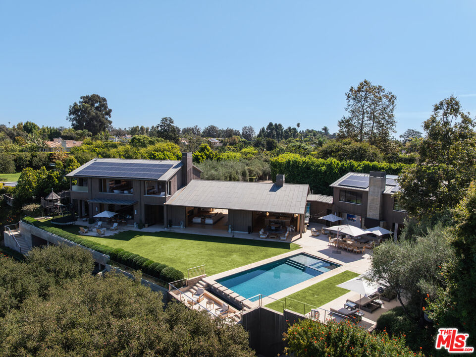 859 Woodacres Road Santa Monica, CA 90402 - Photo 4 of 54 a view of a house with a big yard
