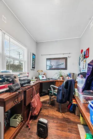 a living room with furniture window and a table