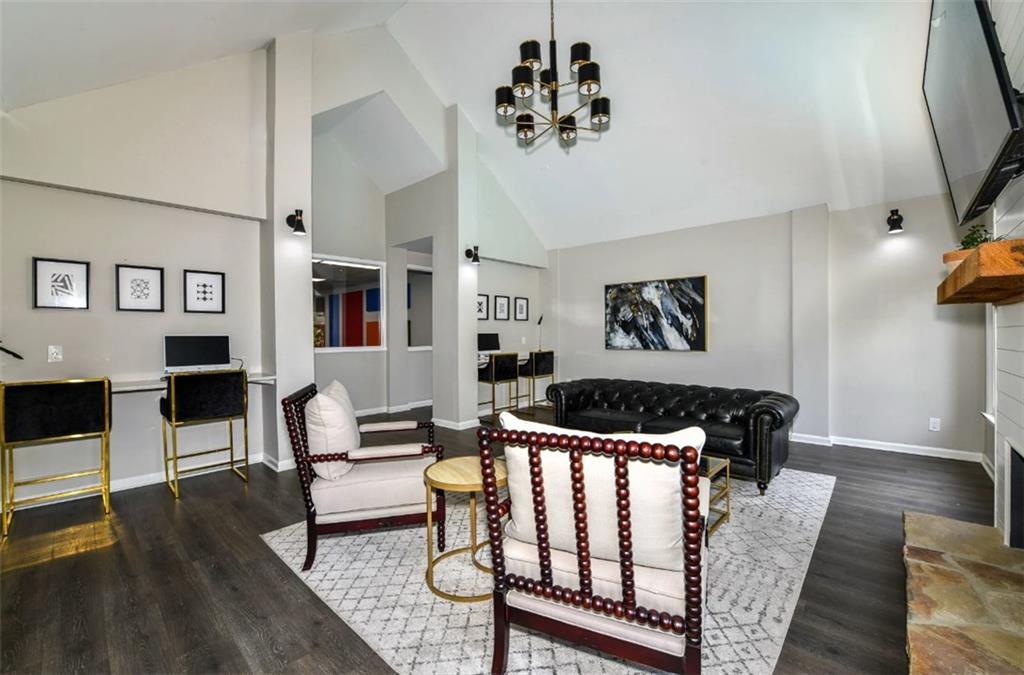 670 Thornton Road, Unit 506 Lithia Springs, GA 30122 - Photo 16 of 26 a living room with furniture and wooden floor