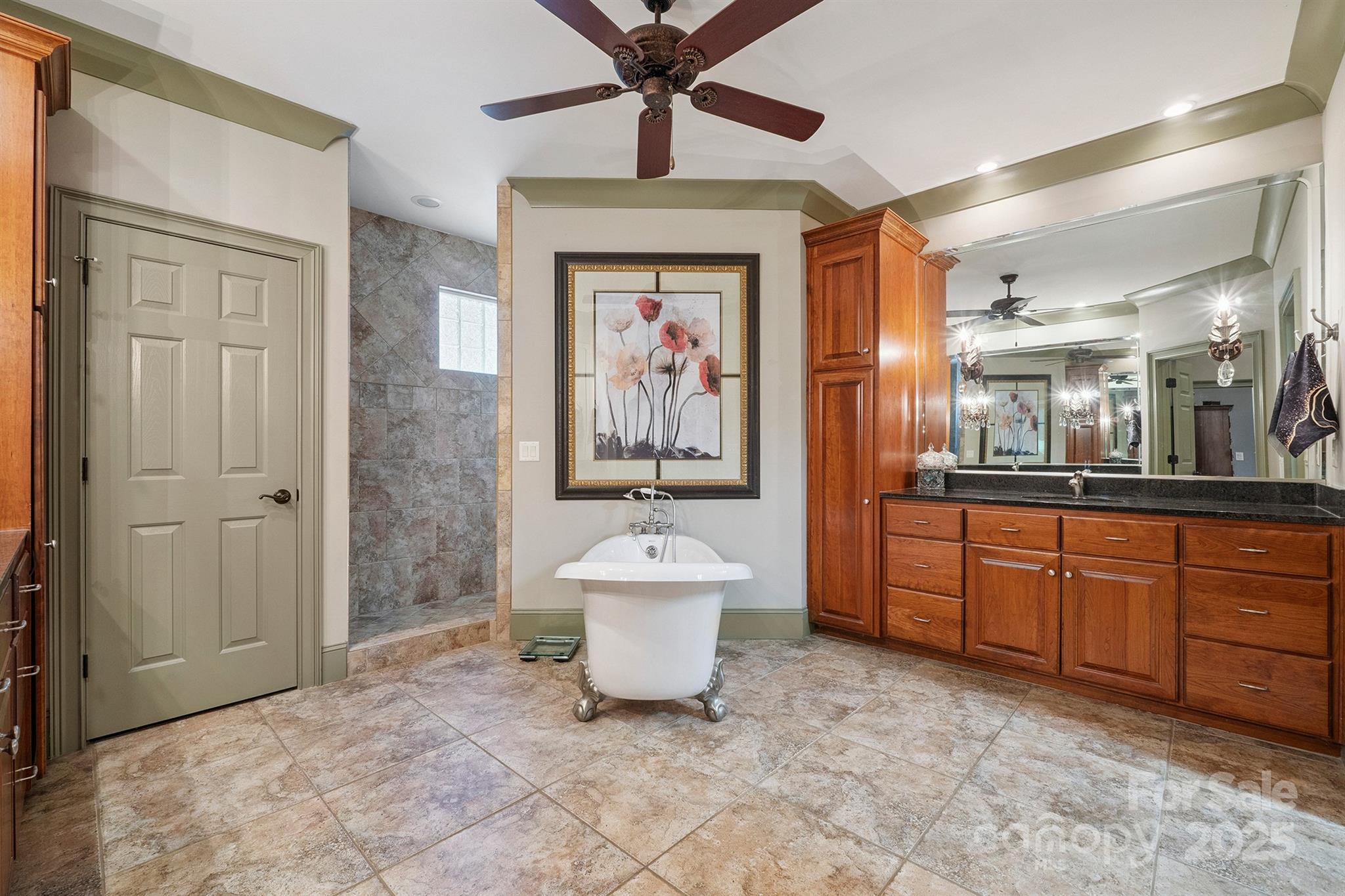 8304 Renee Ford Road Stanfield, NC 28163 - Photo 19 of 30 a spacious bathroom with a double vanity sink a mirror and a bathtub