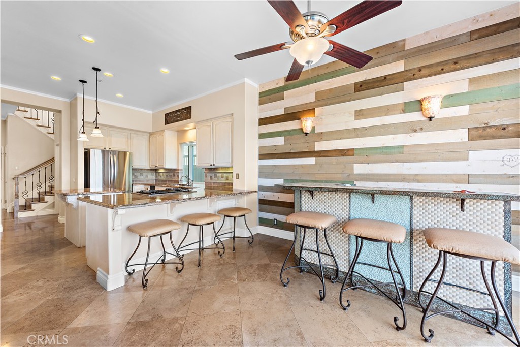 33852 Bridgehampton Drive Dana Point, CA 92629 - Photo 13 of 51 a view of a dining room with furniture and a chandelier