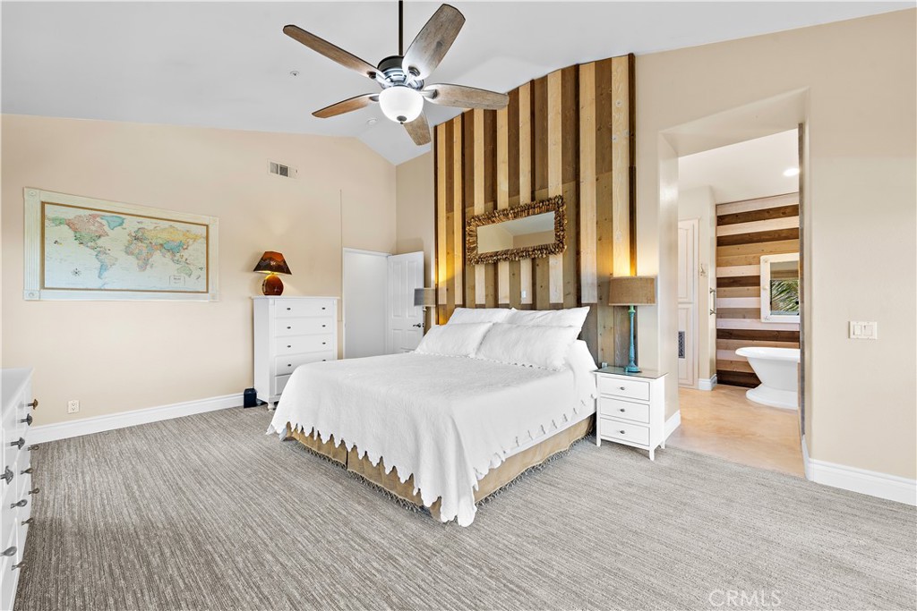 33852 Bridgehampton Drive Dana Point, CA 92629 - Photo 29 of 51 a spacious bedroom with a bed and a window