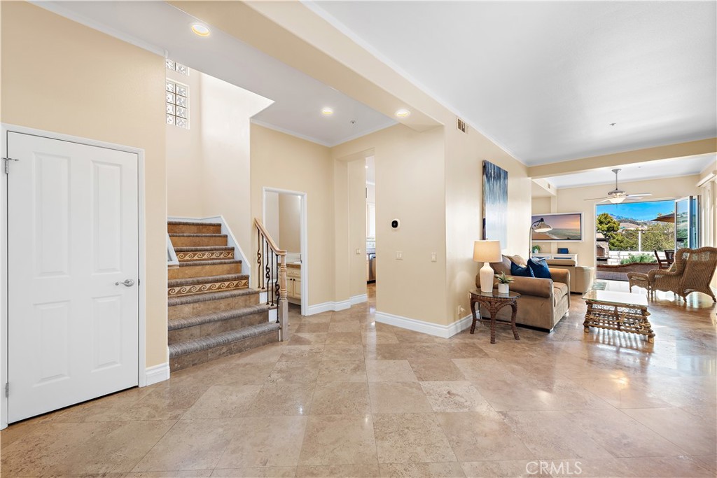 33852 Bridgehampton Drive Dana Point, CA 92629 - Photo 6 of 51 a living room with furniture and a stairs