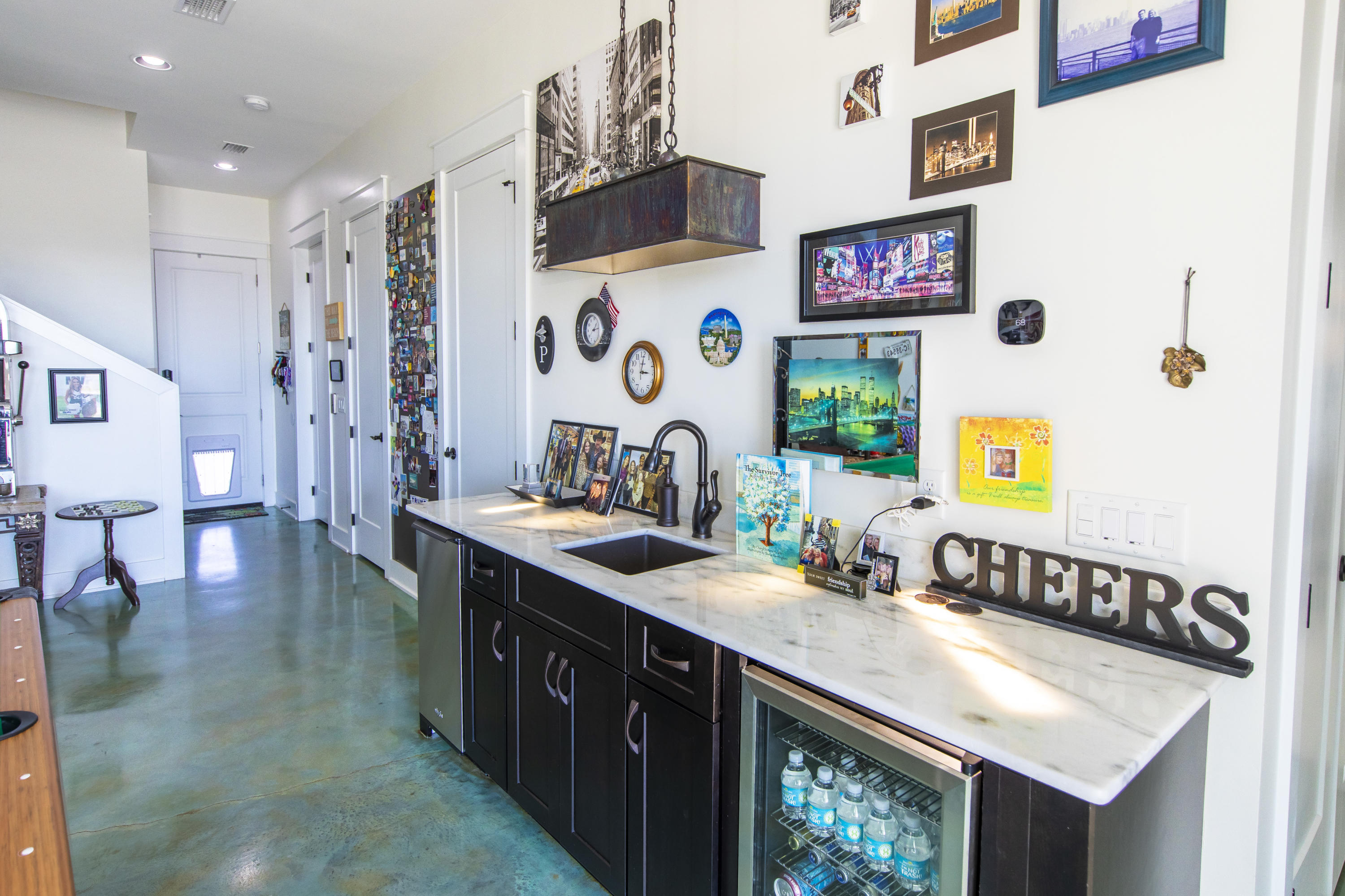 21222 Front Beach Road Panama City Beach, FL 32413 - Photo 11 of 60 a kitchen with stainless steel appliances granite countertop a sink and a stove