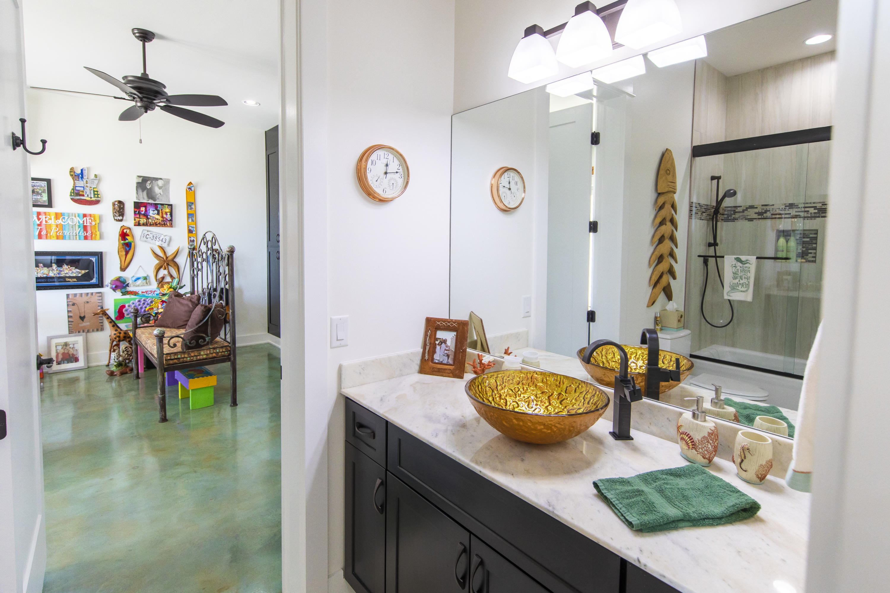 21222 Front Beach Road Panama City Beach, FL 32413 - Photo 15 of 60 a view of a kitchen area with stainless steel appliances granite countertop lots of clutter