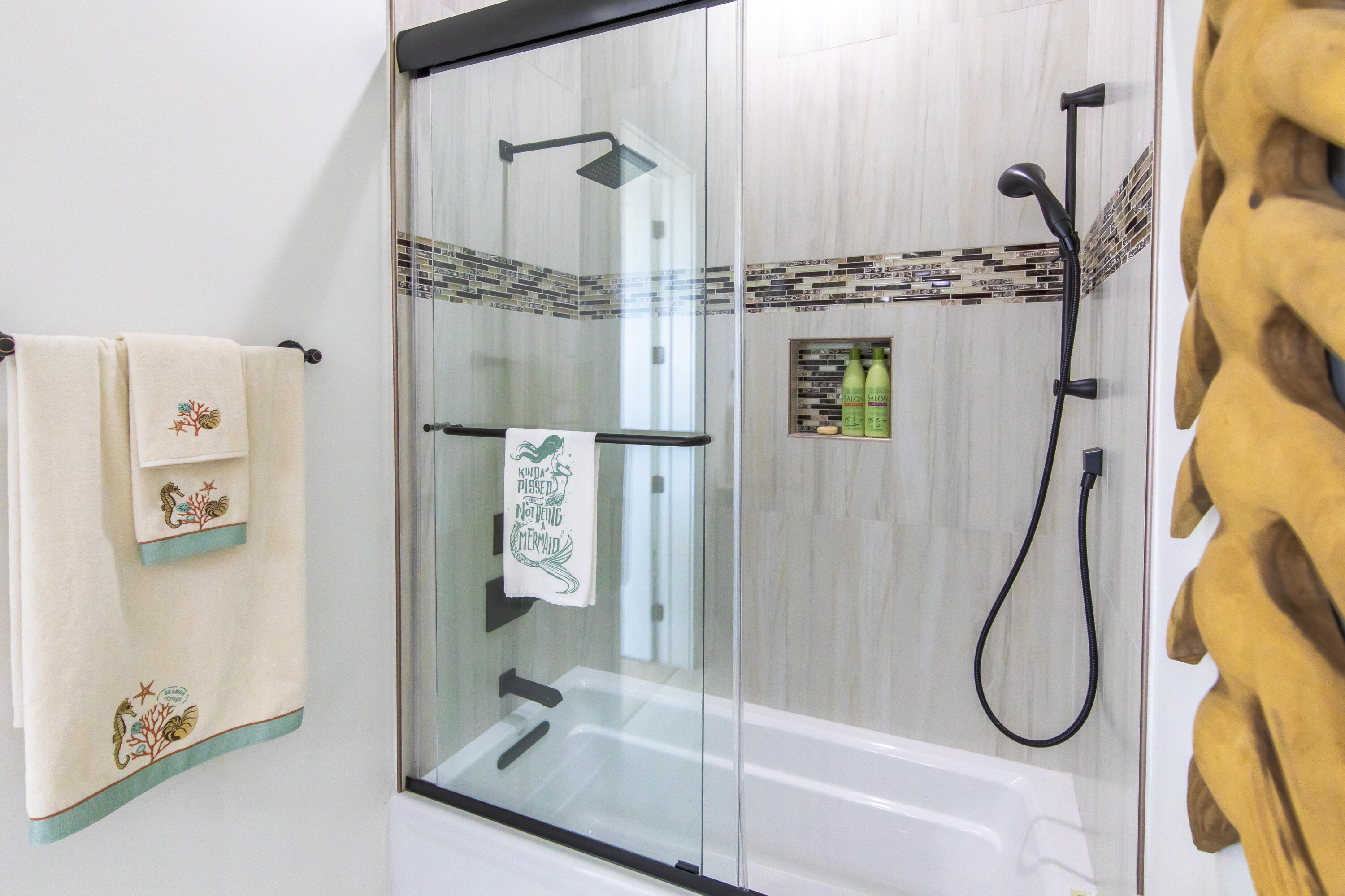 21222 Front Beach Road Panama City Beach, FL 32413 - Photo 16 of 60 a bathroom with a granite countertop shower and a mirror