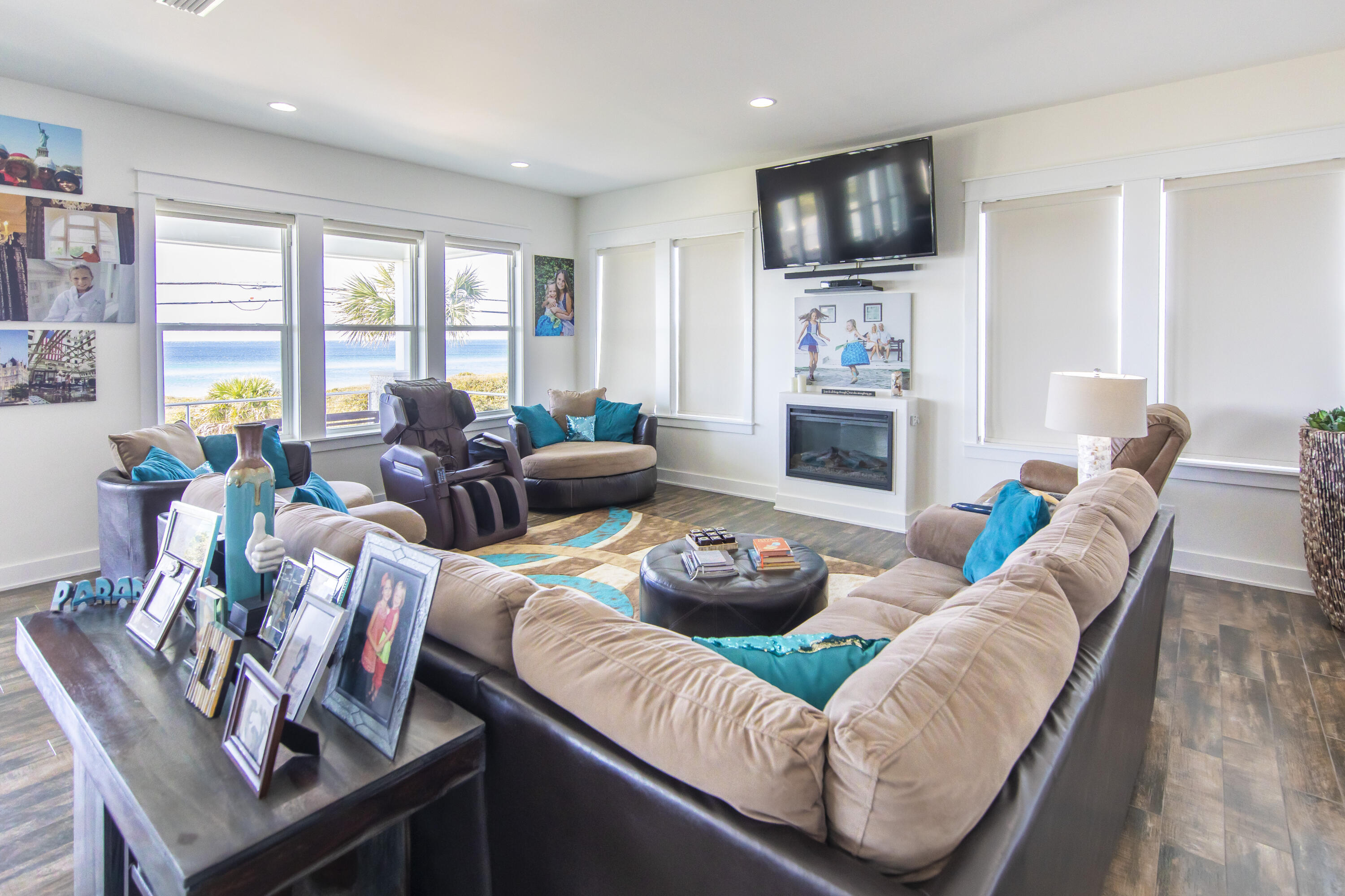 21222 Front Beach Road Panama City Beach, FL 32413 - Photo 23 of 60 a living room with furniture and a flat screen tv